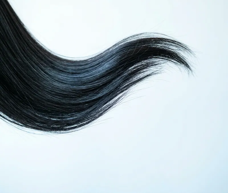 Long natural black Vietnamese human hair, straight with a soft wave
